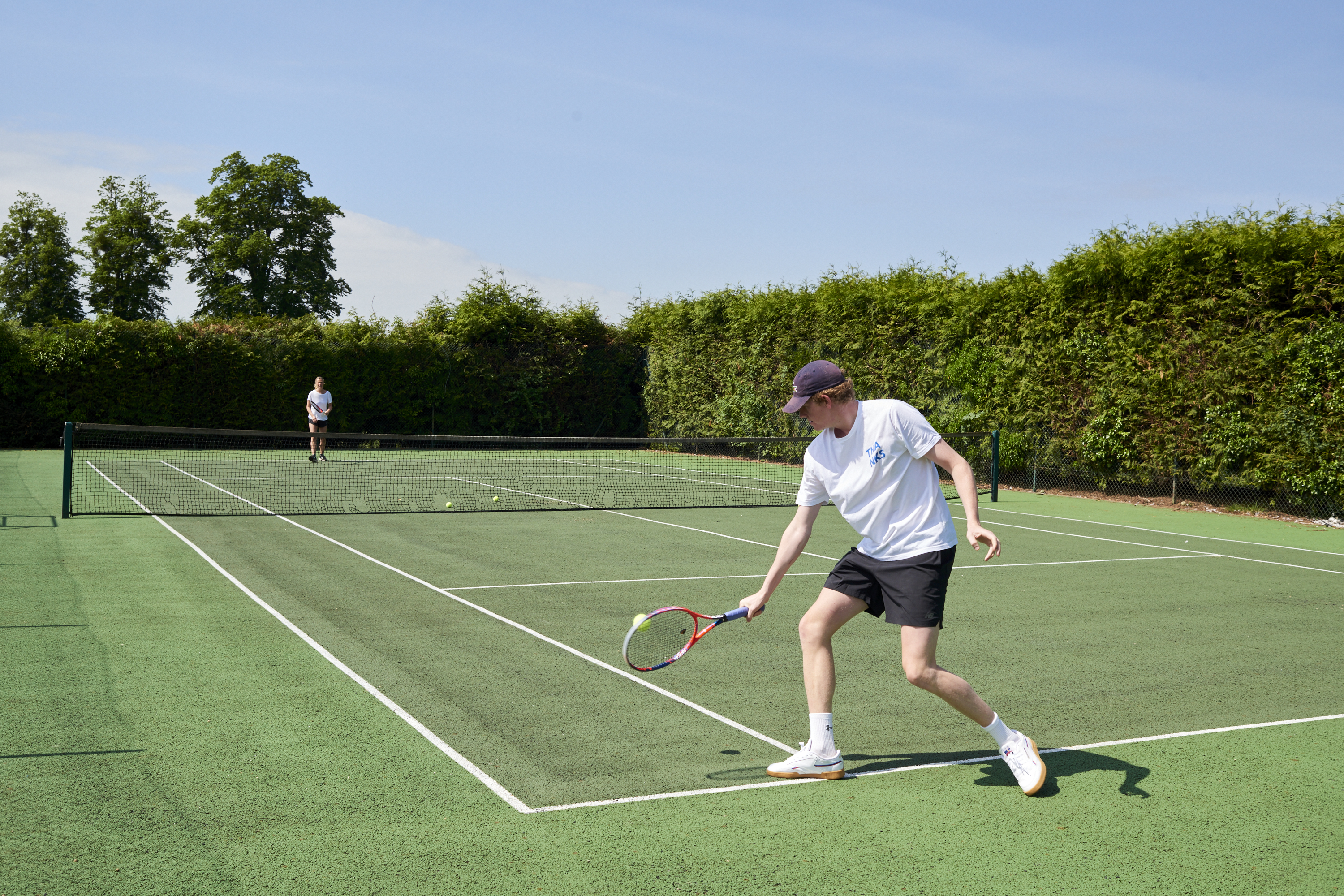Private tennis court at Grendon Court