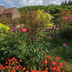 Colourful gardens at Grendon Court